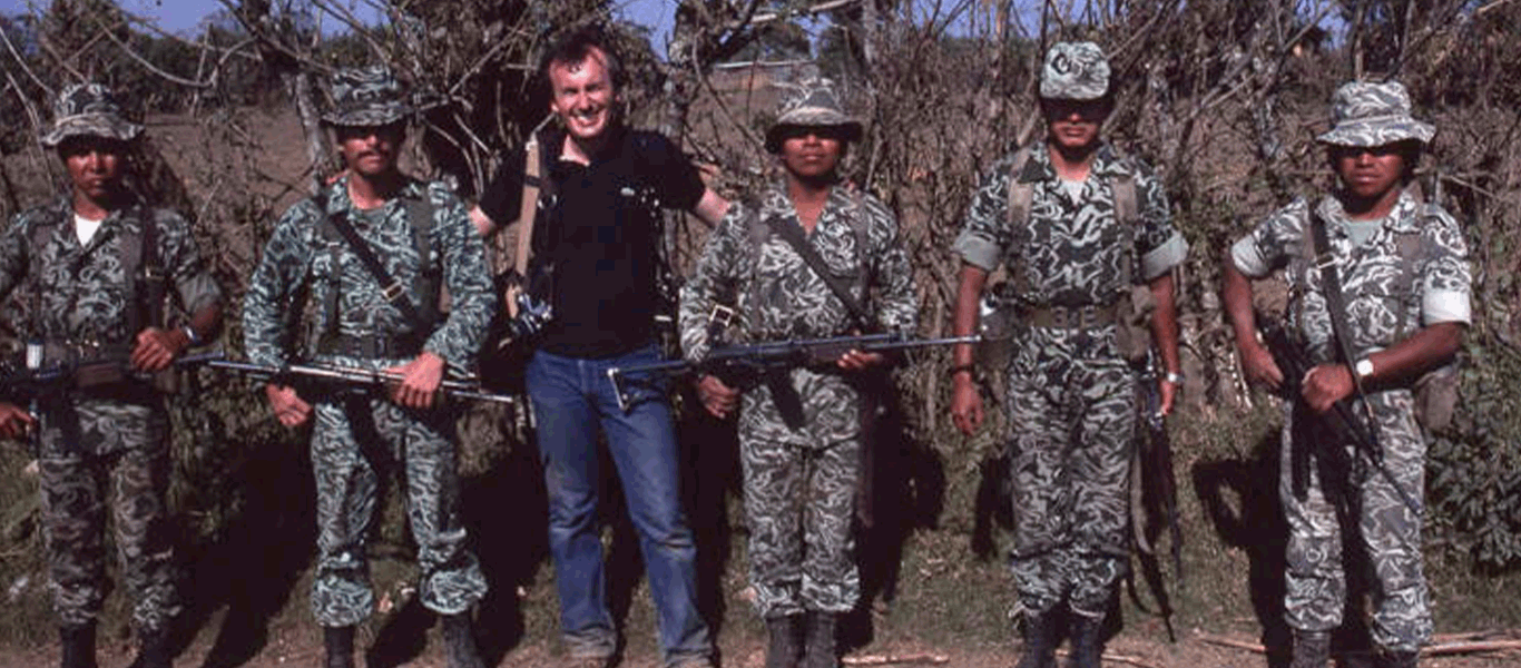 Richard Cross posing with soldiers