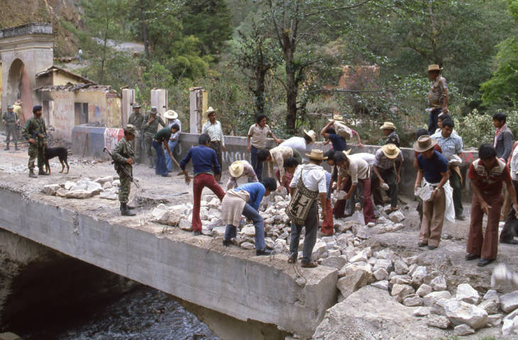 Civilians repairing destruction of bridge, Chichicastenango