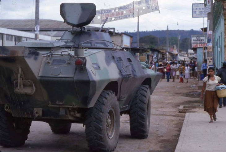 An army Cadillac Gage Commando patrols the streets of Chimaltenango
