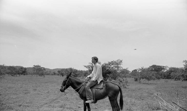 Richard Cross riding a mule